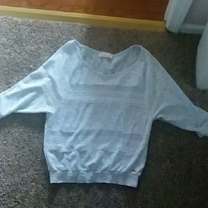 Very cute top light blue in color